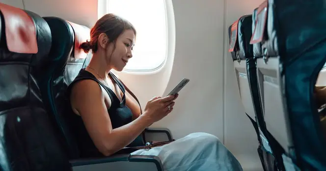 Flight Attendants Warn Against Retrieving Dropped Phones Due to Safety Risks