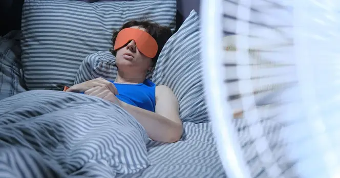 Expert Reveals Best Sleeping Positions for Staying Cool This Summer