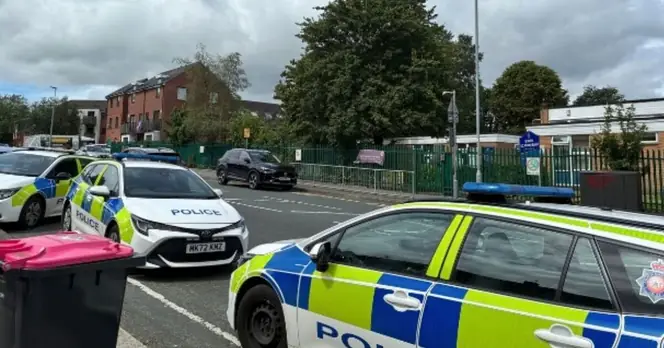 Salford Primary School Locks Down After Intruder Enters Grounds with Brick