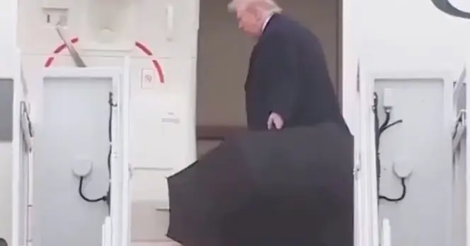 Trump's Struggle with Umbrella Raises Health Concerns Amid Iran Discussions
